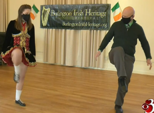 Irish step dancer teaching someone how to dance